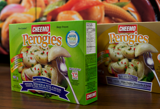  Two of the 12 perogy flavors manufactured under the flagship CHEEMO brand label by Heritage Frozen Foods at its 80,000-square-foot production plant in Edmonton.