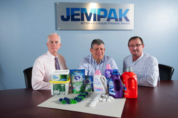 From Left: JemPak president Steve Miller, chief executive officer Charles Zuckerman, and vice-president of operations Emil Tarnowsky show off some of the high-quality dishwasher and laundry detergents manufactured in various packaging formats for its private-label customers at the company’s Ontario-based production facilities in Concord and Oakville.