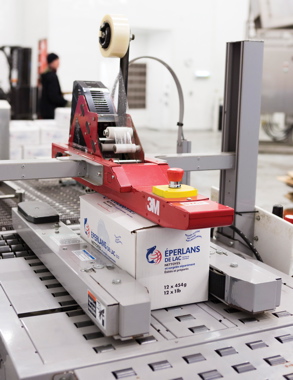 Equipped with an Accuglide three-tape head, the 3M-Matic case-sealing machine from 3M Company applies strips of 3M’s Tartan 369 clear tape onto the filled five-kilogram boxes of product just prior to the final metal detection test.