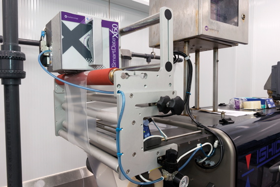 Integrated with an Ishida tray-sealer supplied by Techno-Pak, a model SmartDate X60 thermal-transfer coder from Markem-Imaje applies all the required product codes on top of the product labels attached onto the finished plastic clamshell packages.