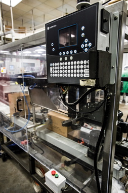 A high-speed Domino model C6000 inkjet case-coder applies all the required variable product information onto the sides of filled shipping cases.
