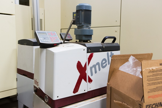 One of many Baumer hhs model Xmelt adhesive melters used to secure individual cigarette packs at the Ohsweken facility.