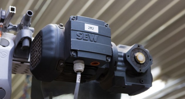 A close-up of an SEW-Eurodrive motor that helps provide the power to the FlexLink X85 wedge conveyor system.