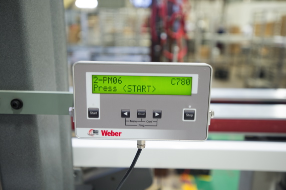A touchscreen operator control panel for the high-speed Weber print-and-apply labeling system enables user-friendly operation and fast product changeovers at the busy plant.