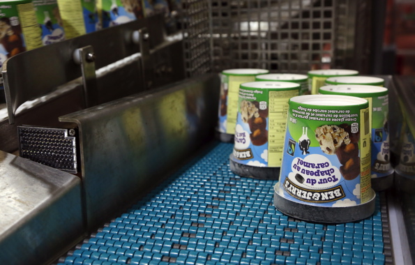Highly hygienic SystemPlast belting from Regal Beloit is used to carry tubs of Ben & Jerry’s ice cream on a conveyor line manufactured by Descon Conveyors.