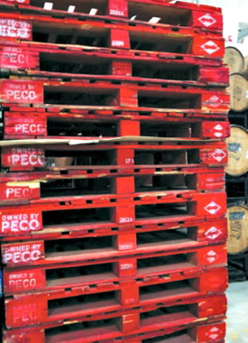 The Collective Arts beermaking plant in Hamilton uses a variety of pallets to ship its product, including those manufactured and rented out by PECO Pallets, Inc.